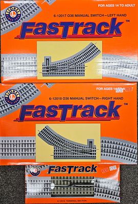 Lionel O Gauge FasTrack Lot of 3 C-9+. Lionel FasTrack Lot of 3 C-9+ condition in box. 1.