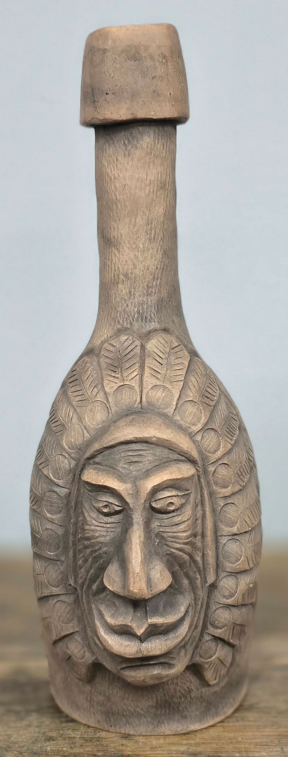 Lot 13: Swany Cornett Native American Face Bottle