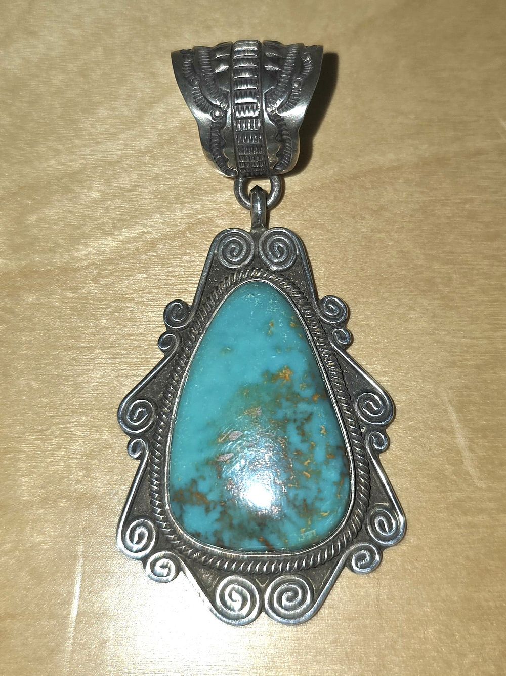 Lot 24: Signed "TM" Navajo Turquosie Pendant