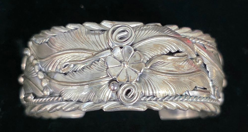 Lot 26: Stunning Navajo Silver Floral & Feather Bracelet