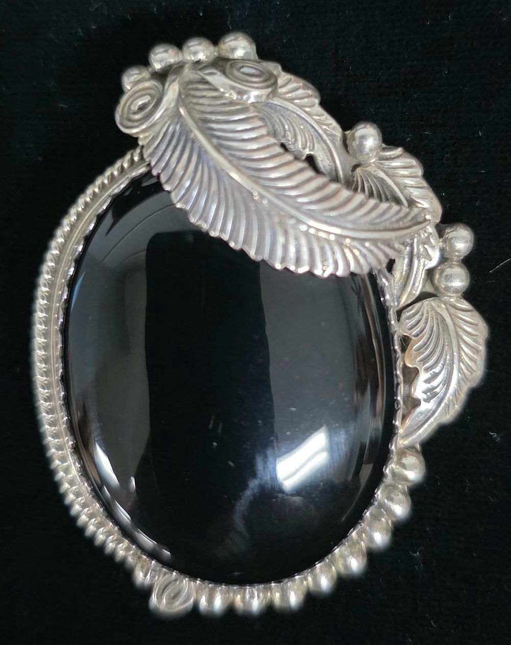 Lot 29: Navajo "LR" Black Onyx & Silver Pendant