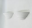 Pair of Modern White Ceramic Wall Sconces. Sleek and minimal pair of white ceramic wall sconces Image - 2