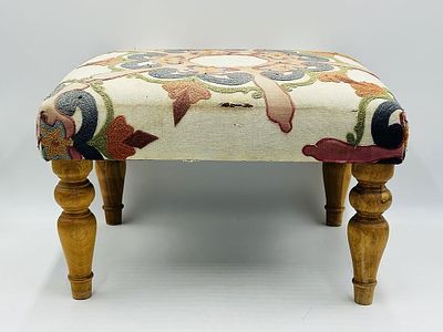 Vintage Stool/Ottoman With Bright Upholstery. Vintage stool/ottoman with a very cool upholstery. 