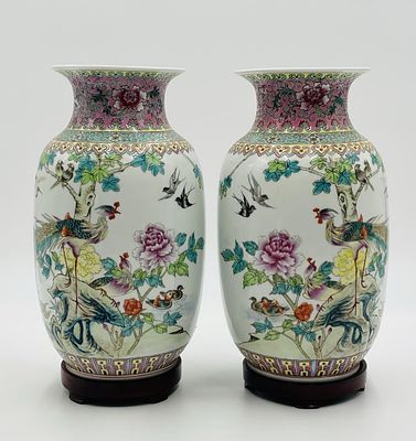 Matched Pair of Chinese Jingdezhen Famille Rose Porcelain Vases. A matched pair of Chinese 