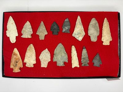 Frame of Vintage Arrowheads. Flaked stone projectile points exhibiting triangular, stemmed and 