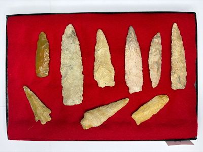Frame of river-worn Paleo and Archaic Blades. River-patinated flint and chert blades and 