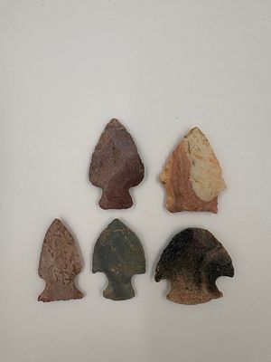4 Colorful Hopewell Points. Four colorful Hopewell projectile points crafted from varying stone 