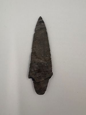 Dickson - 3 1/4in. 3 1/4-inch Dickson-style point made from striped grey-brown chert. Bifacially 