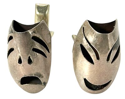 זוג חפתים "שמח ועצוב" עשויים כסף סטרלינג 925 . משקל כולל : 7.27 גרם 
22X15 מ"מ