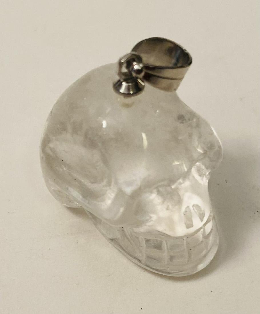 Lot 180: Quartz skull pendant- clear