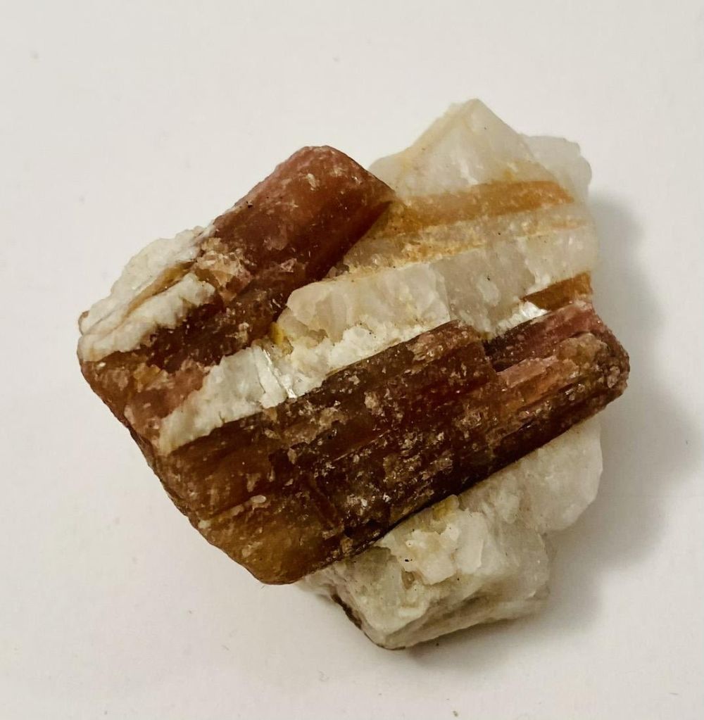 Lot 199: Pink tourmaline specimen in matrix