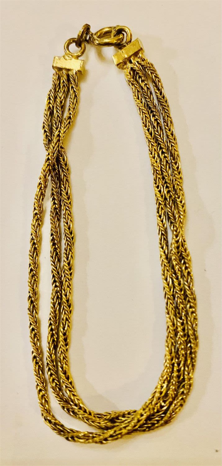 Lot 225: Triple strand bracelet vintage