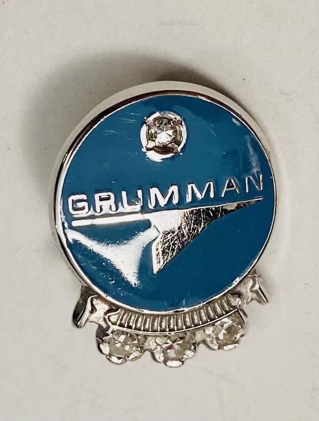 Lot 257: Grumman 10 k medal pin -diamond