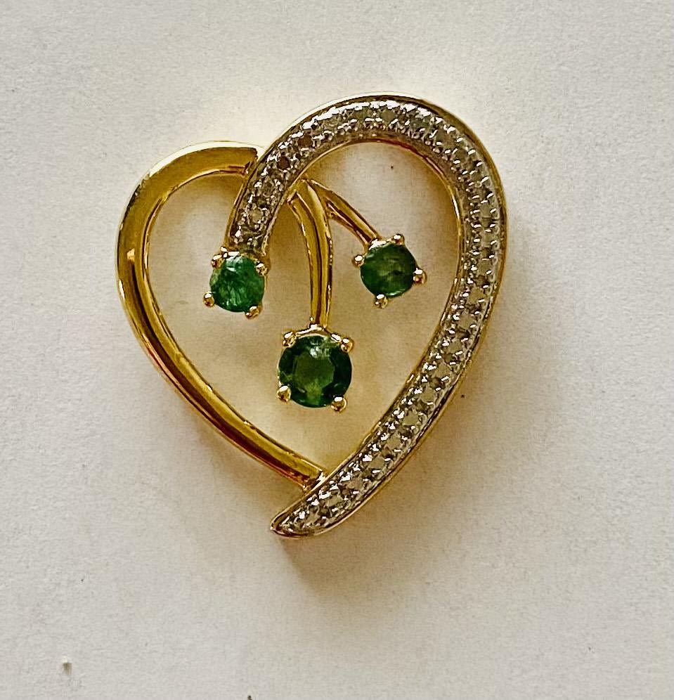 Lot 262: Emerald heart vermeil pendant