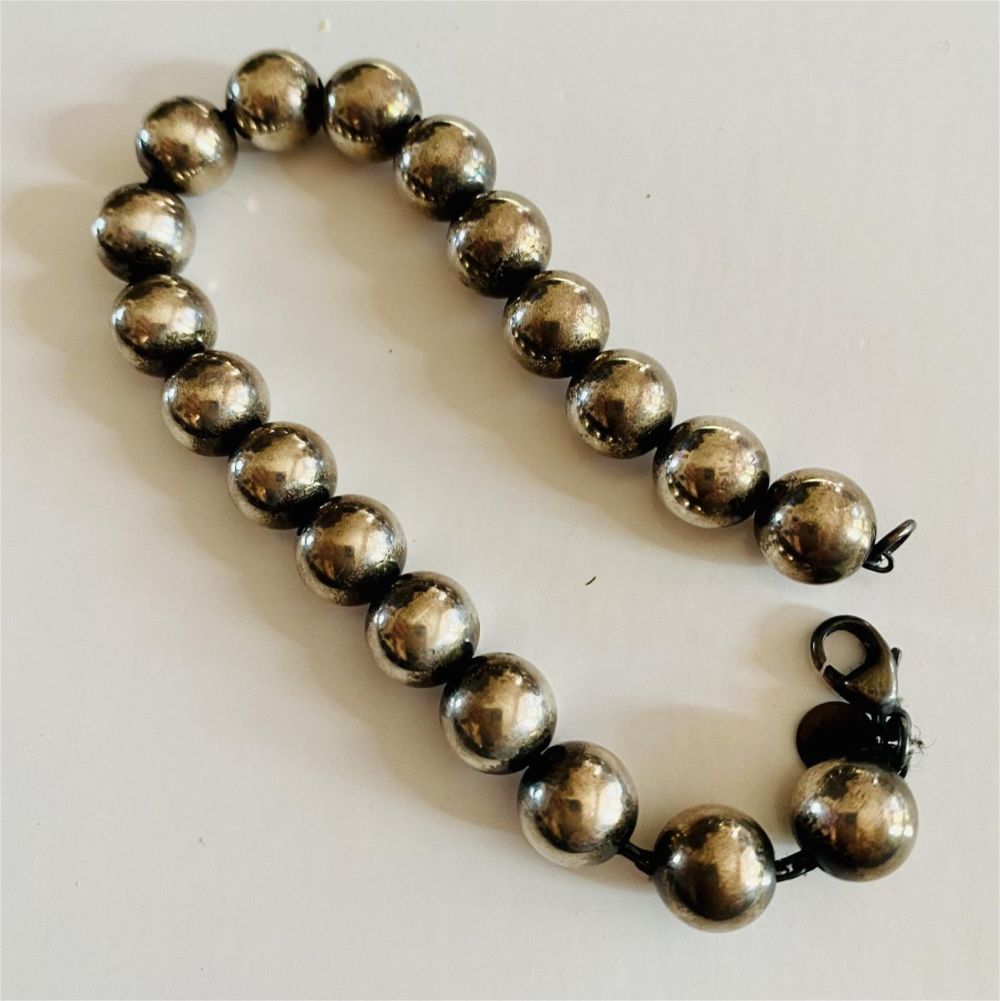 Lot 264: Tiffany sterling bead bracelet signed.