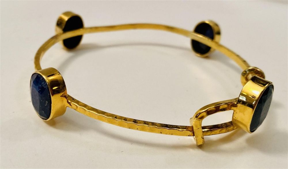 Lot 397: Sapphire bangle vermeil bracelet