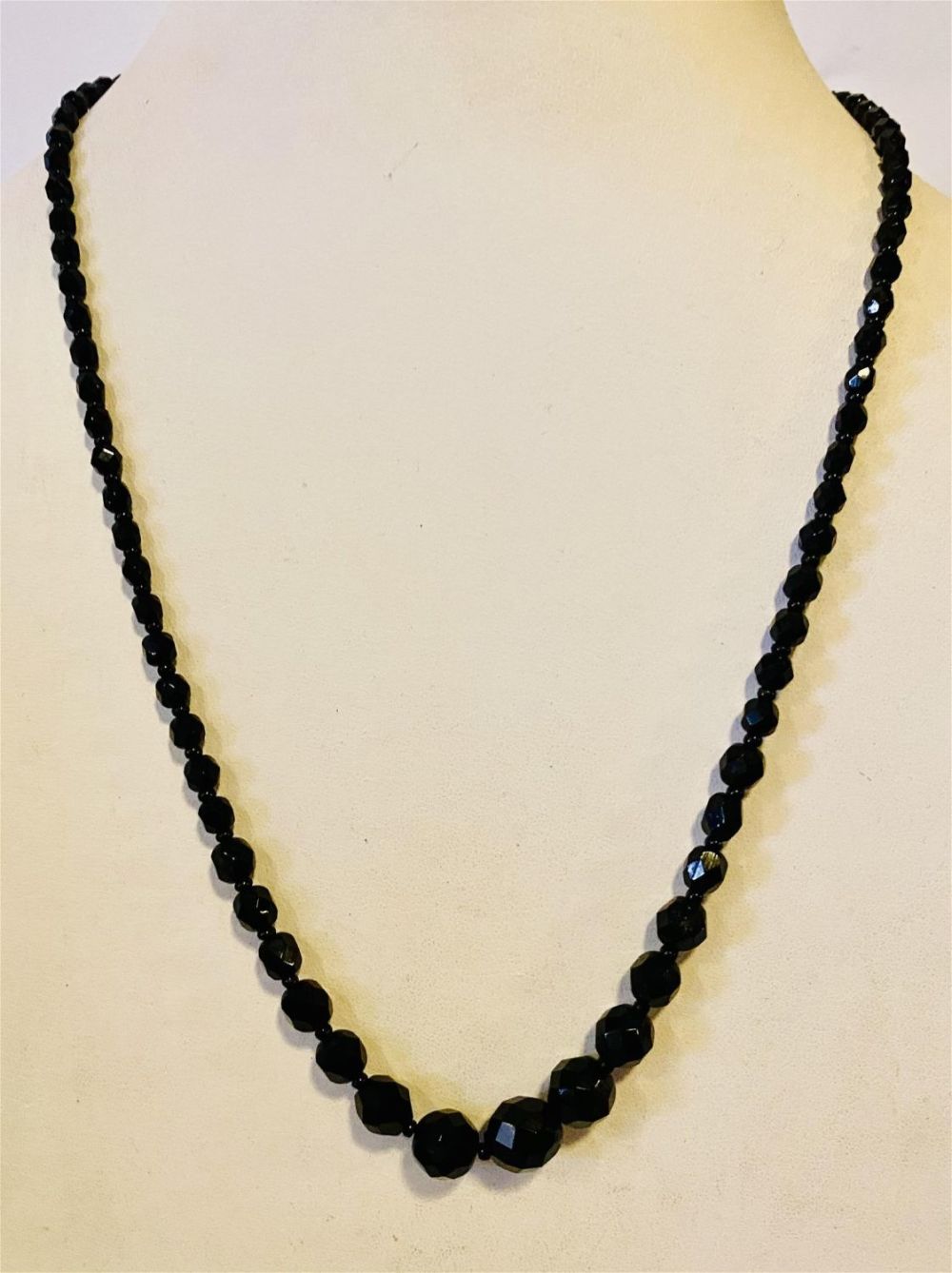 Lot 64: Jet antique graduated faceted necklace