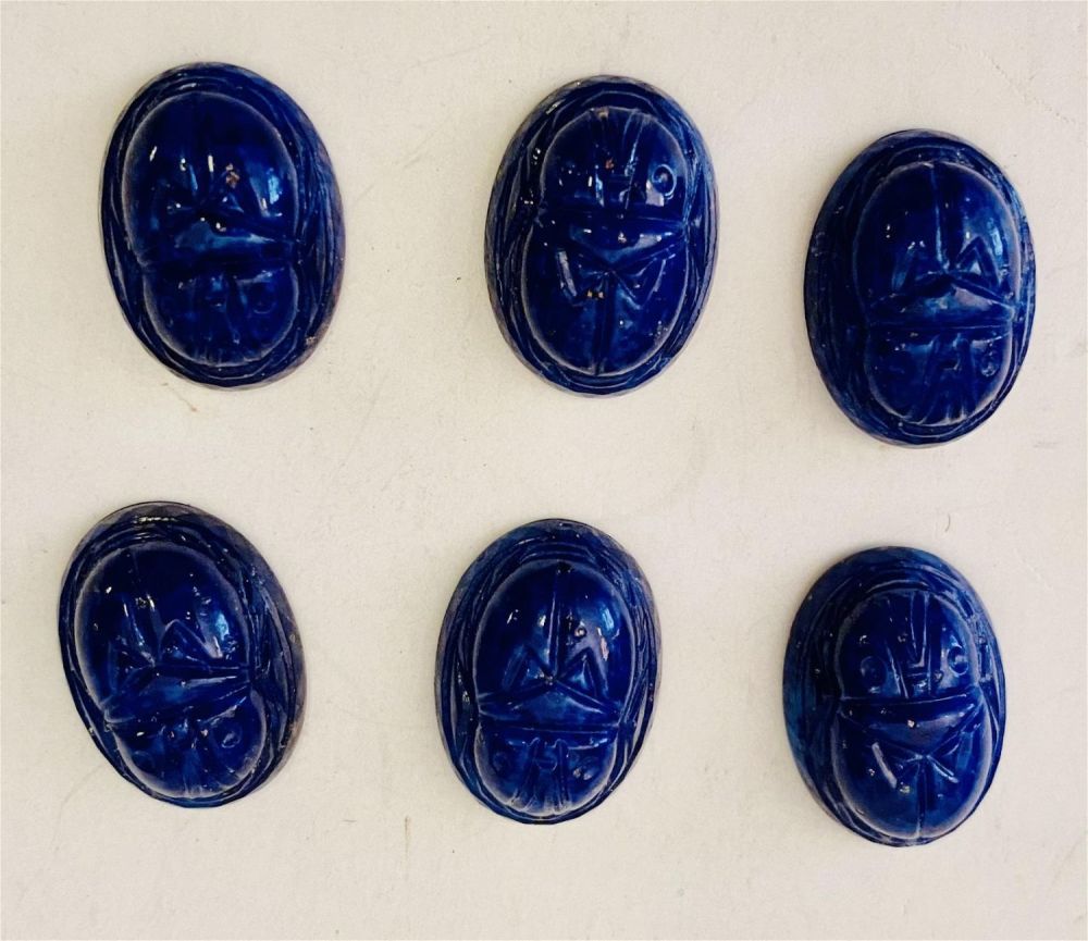 Lot 159: Scarabs oval cobalt glass