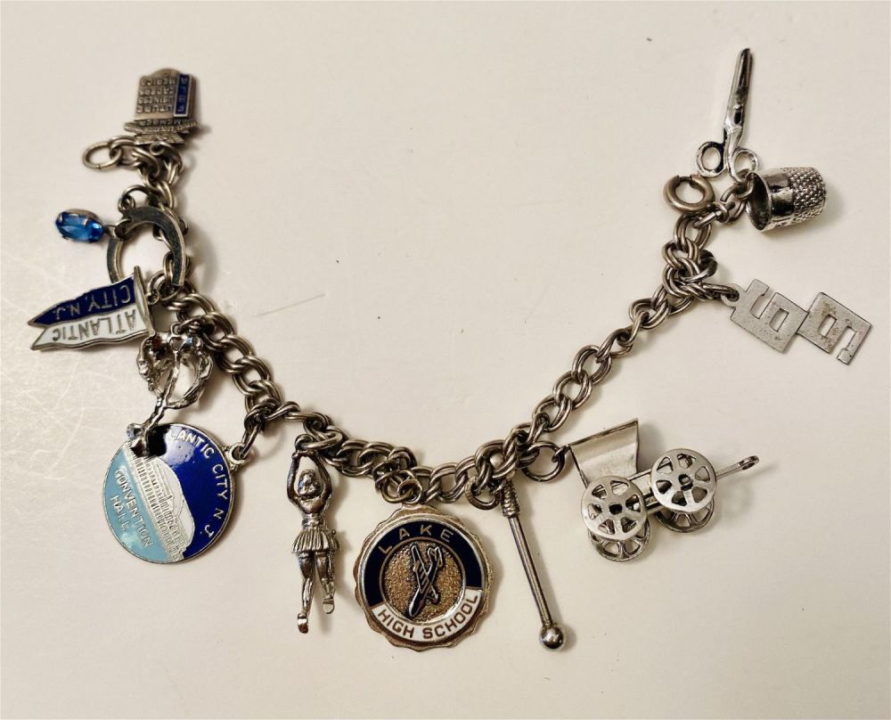 Lot 160: Sterling antique charm bracelet