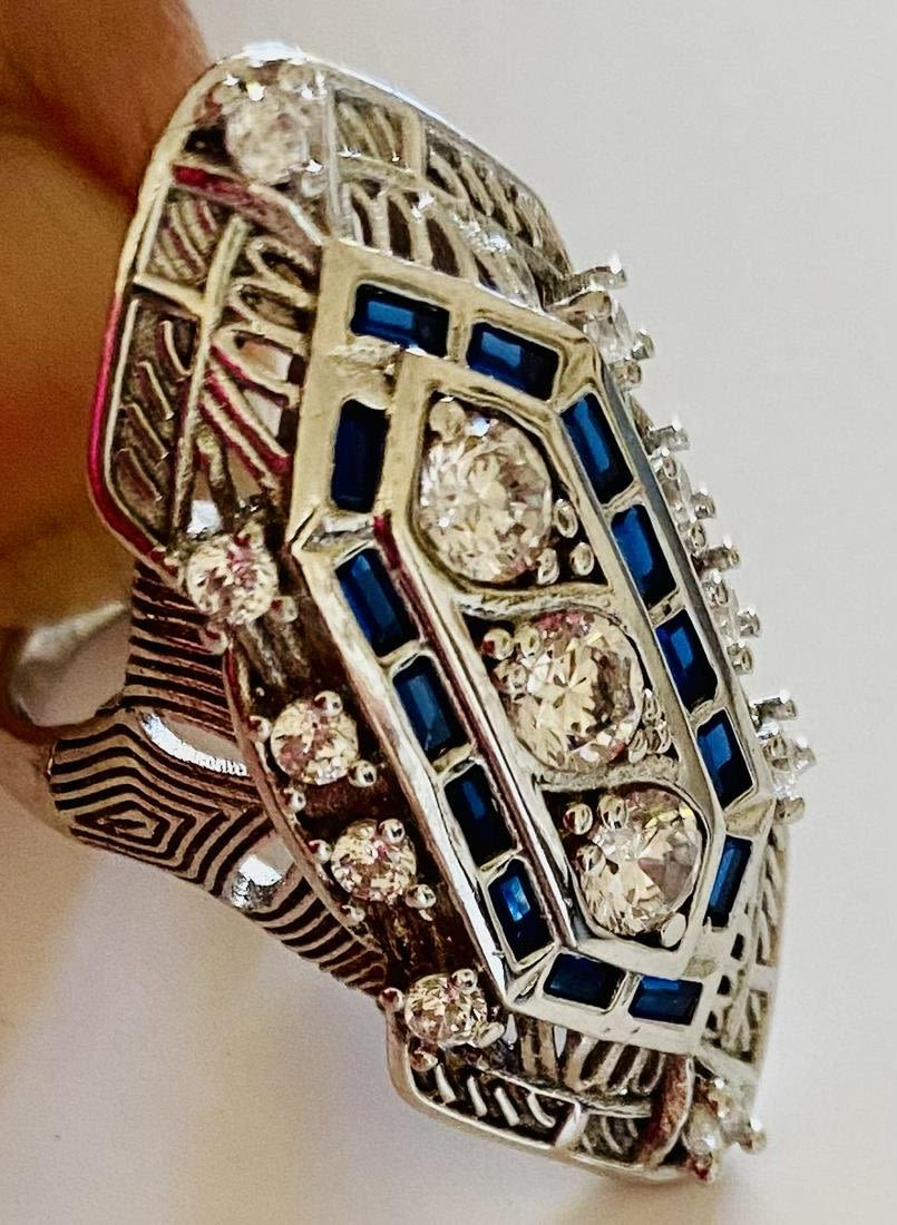 Lot 179: Sterling deco style dinner ring