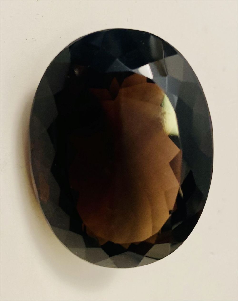 Lot 184: Oval smoky quartz faceted stone