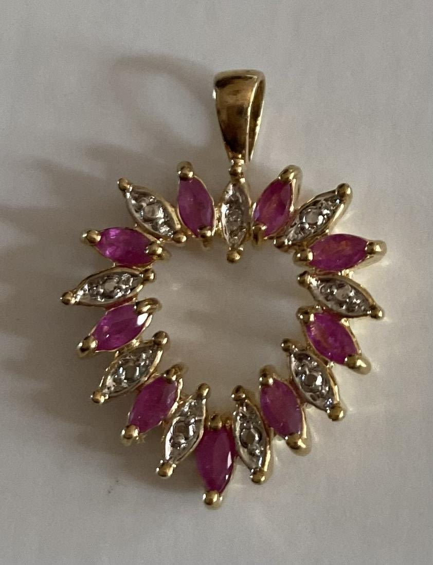 Lot 221: Ruby heart vermeil pendant