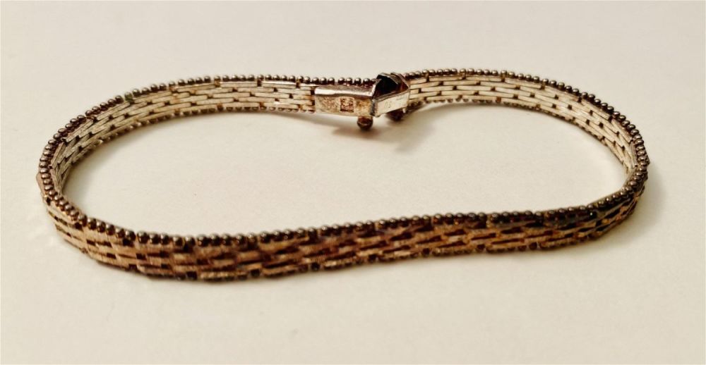 Lot 295: Sterling rose color bracelet
