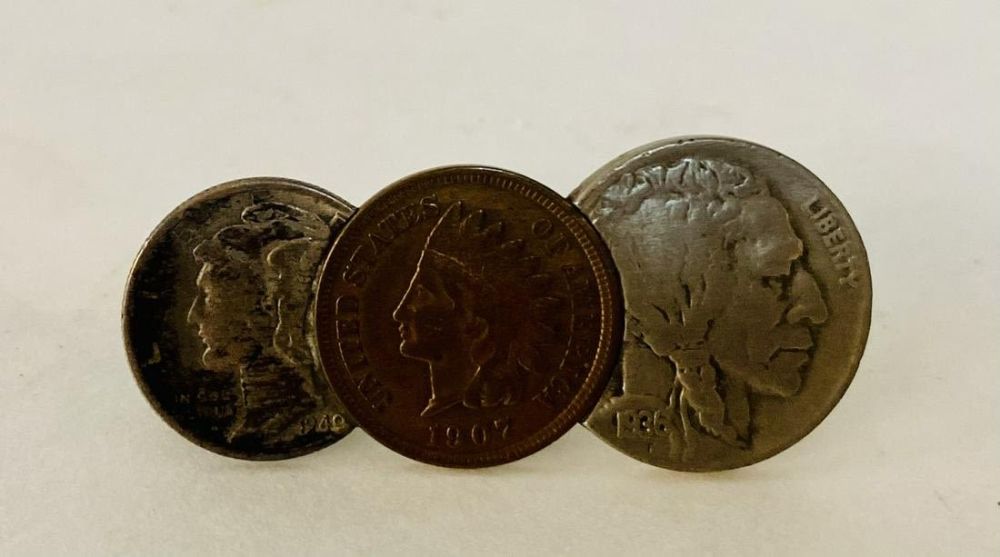 Lot 304: Coin tie clip 1904 penny plus