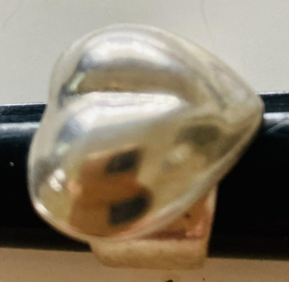 Lot 340: Sterling heart puff ring