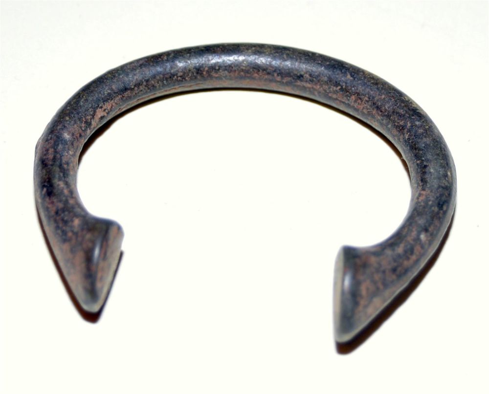Lot 350: Bronze manilla slave bracelet