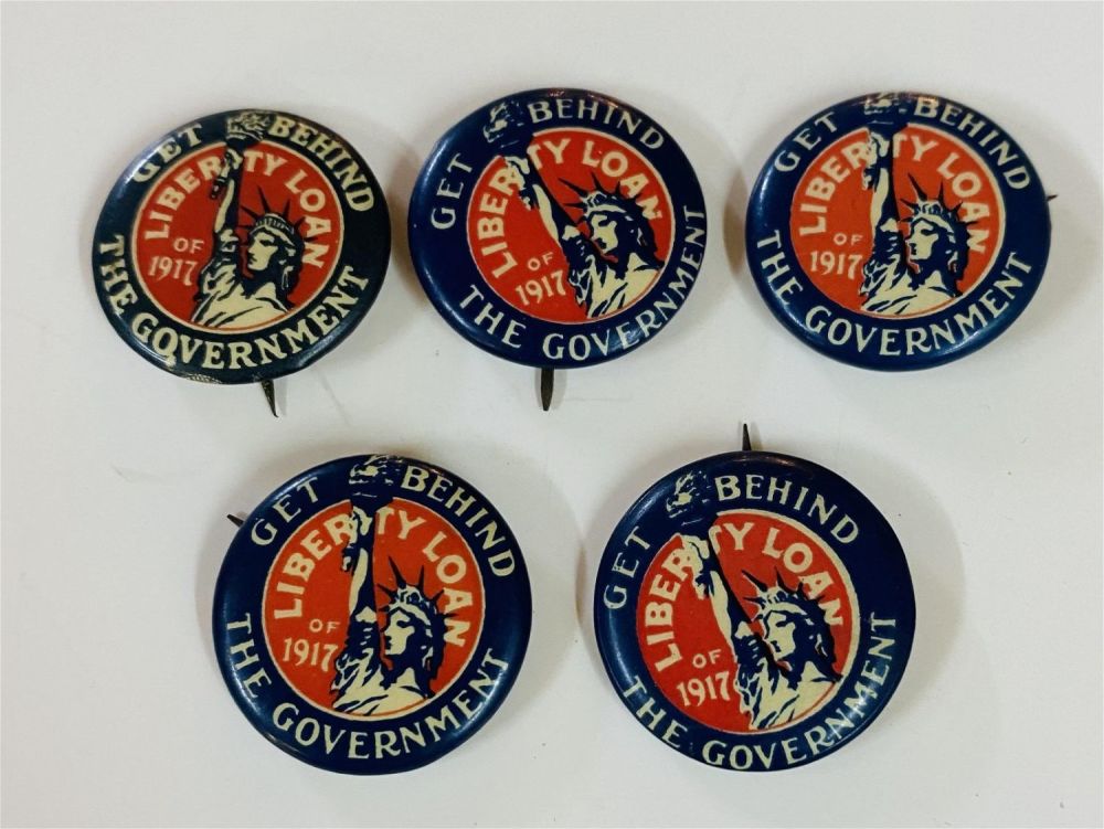 Lot 359: Liberty Loan pin back buttons dated 1917