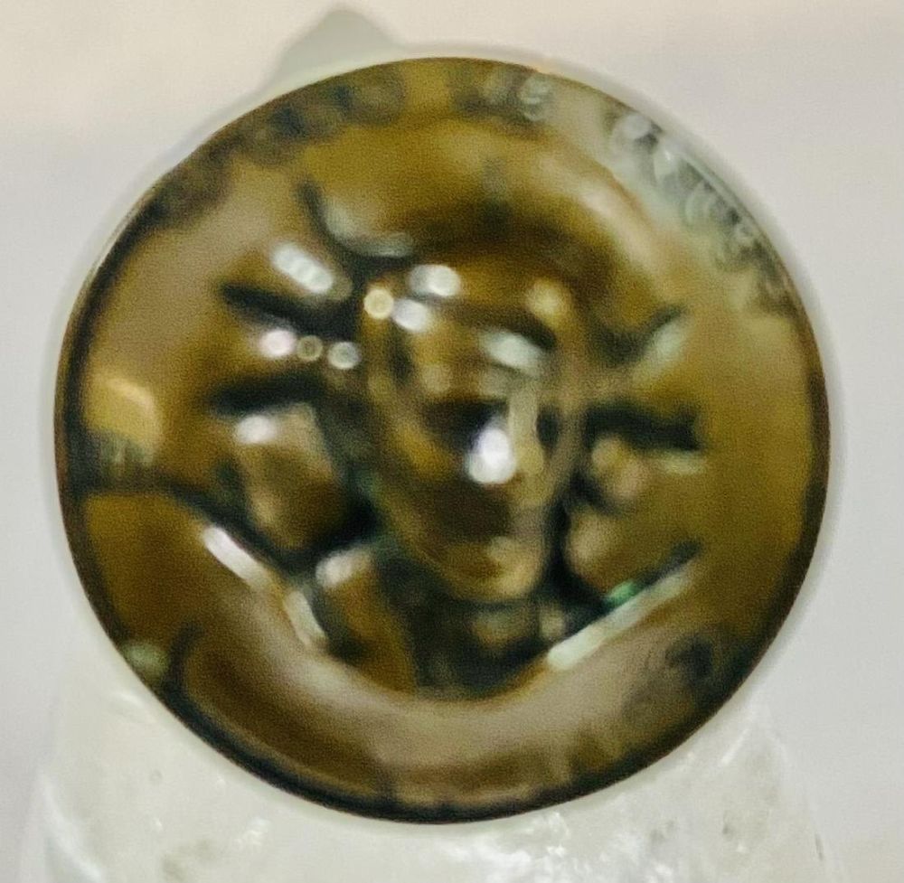 Lot 403: Copper penny repousse pop out ring