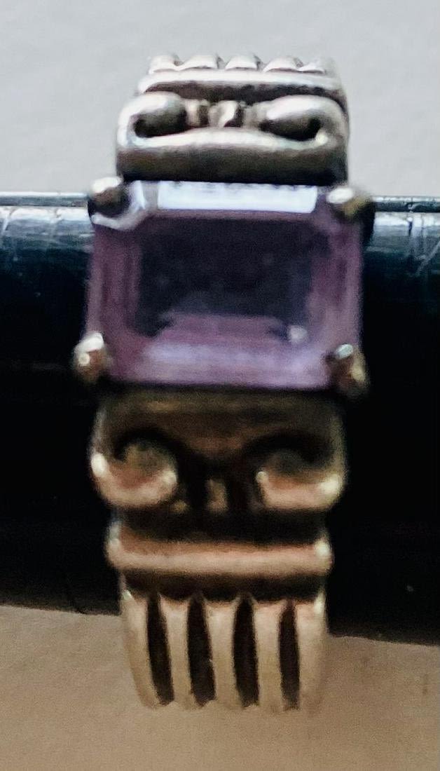 Lot 437: Sterling amethyst emerald cut ring