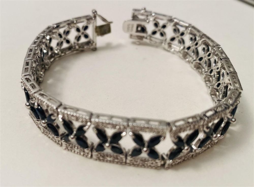 Lot 474: Sterling sapphire bracelet straightline