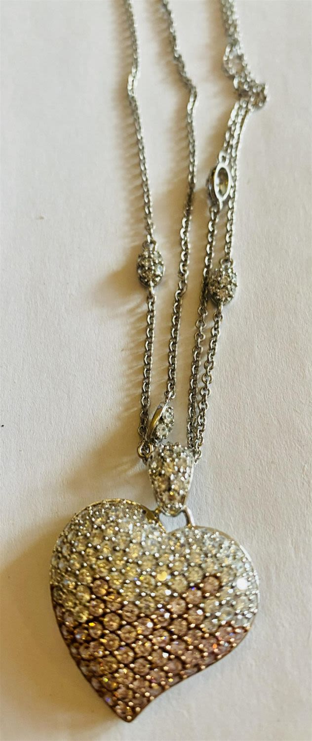 Lot 500: Sterling heart stone necklace- double chain