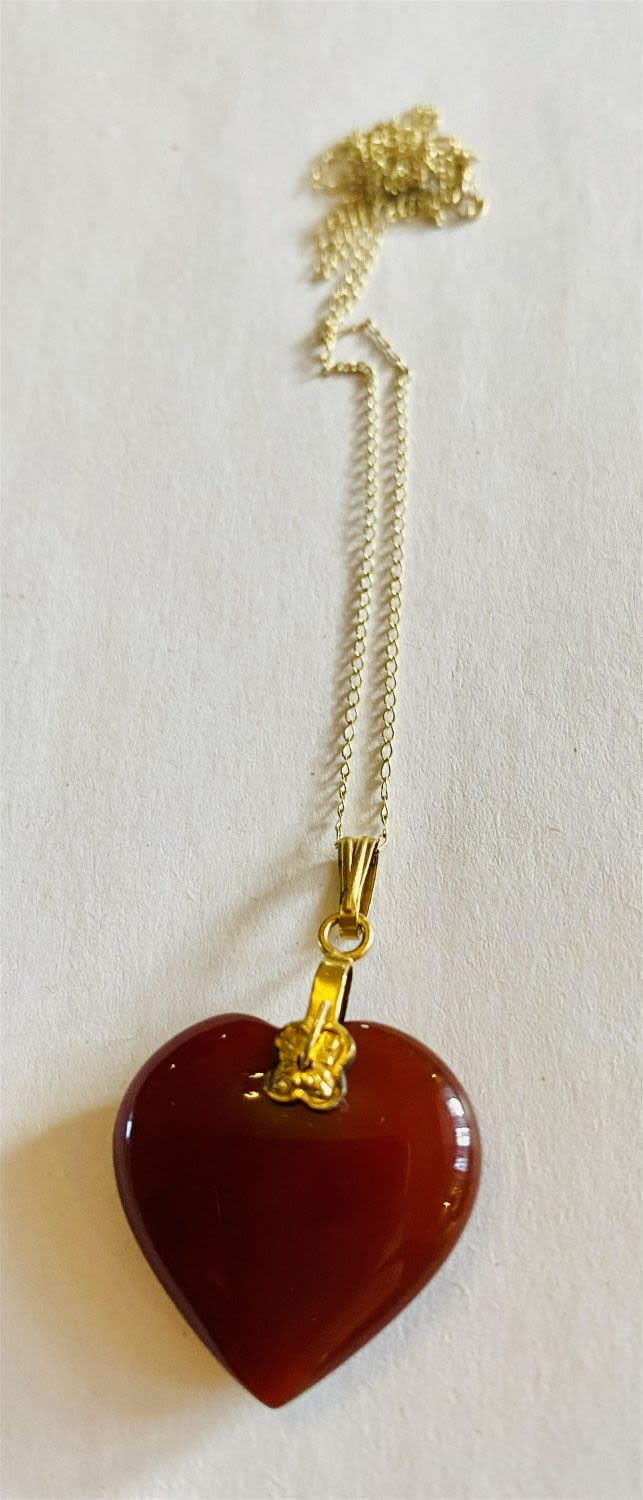 Lot 501: Sterling filigree carnelian vintage heart necklace