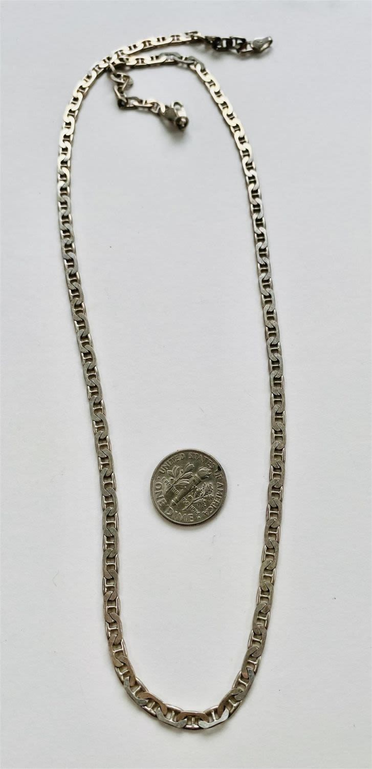 Lot 211: Sterling chain / marine link