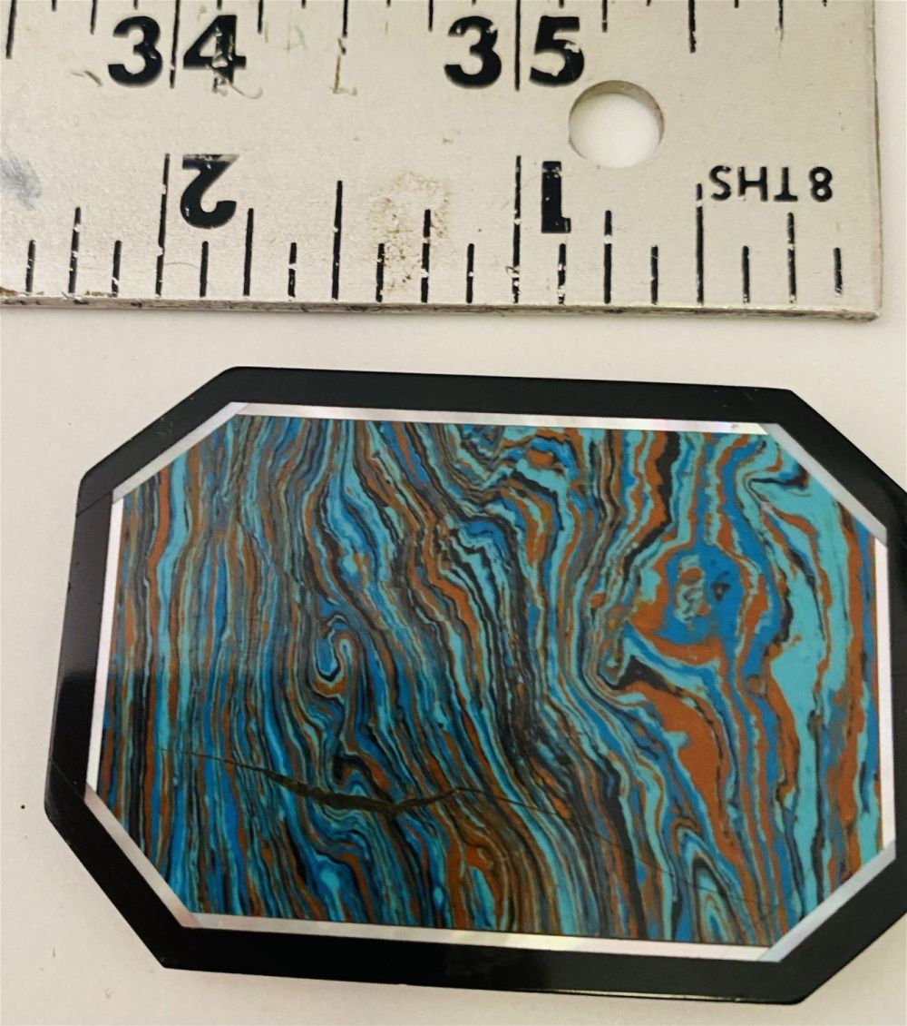 Lot 214: Rainbow calcite or fordite cut specimen