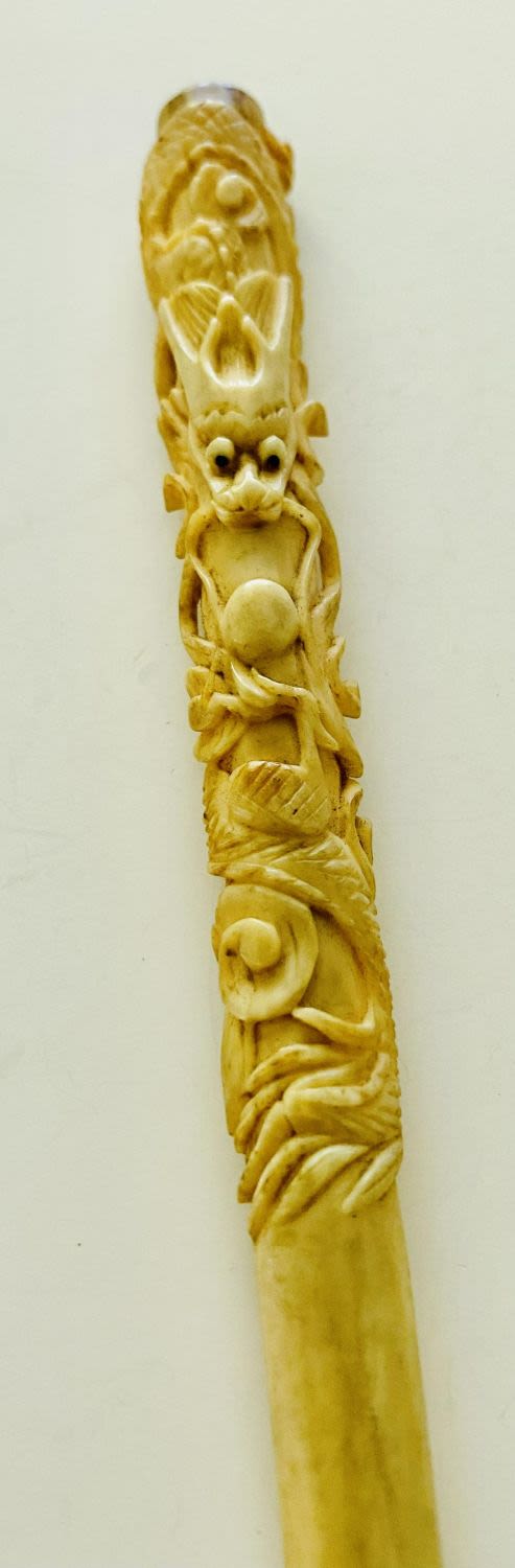 Lot 220: Cigarette holder dragon carved antique