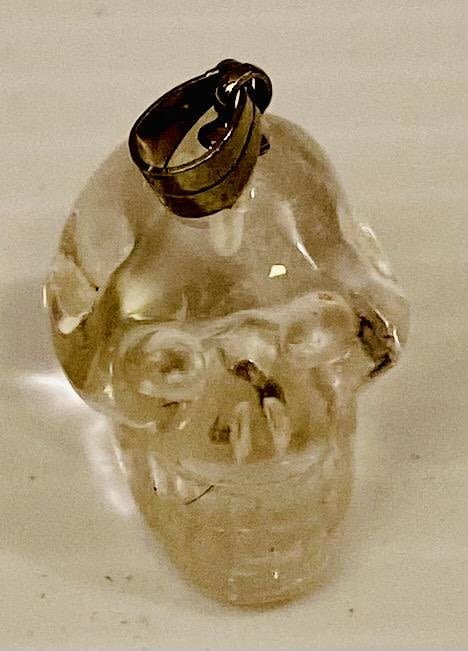 Lot 226: Clear quartz skull pendant