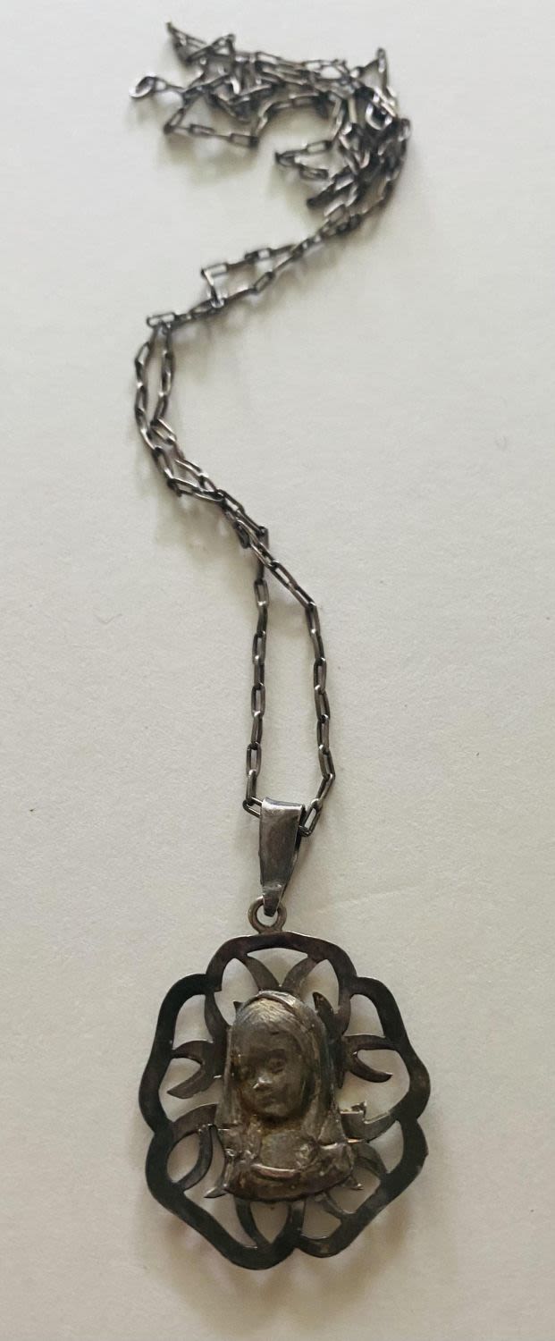 Lot 227: Religious Madonna sterling pendant