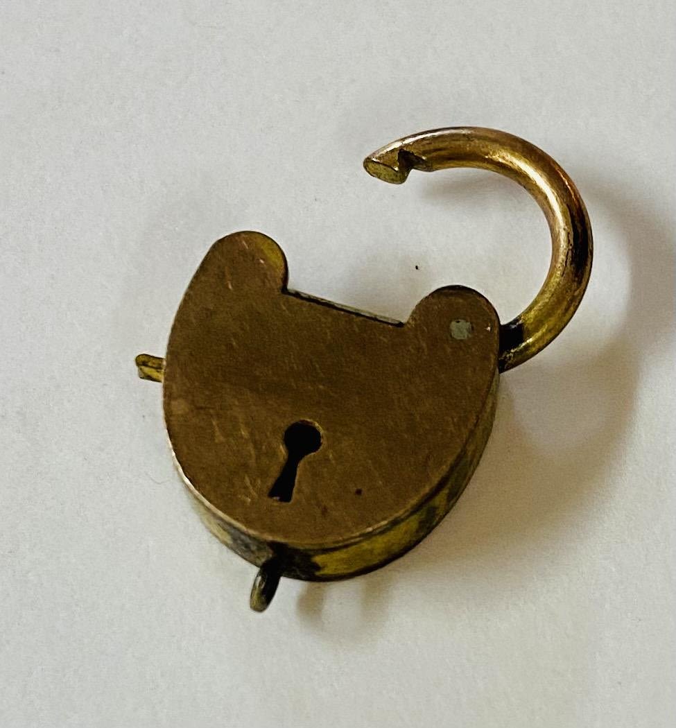 Lot 309: Old padlock miniature charm