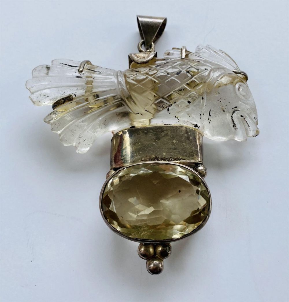 Lot 314: Carved quartz fish massive pendant