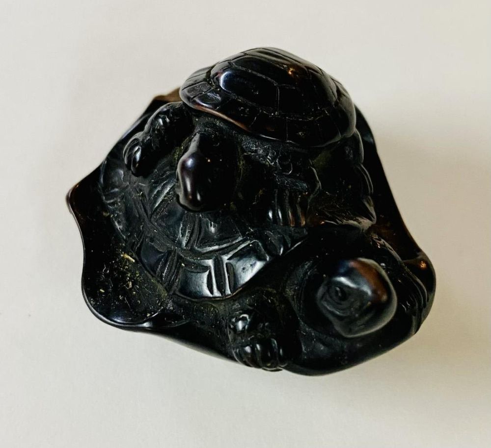 Lot 315: Horn turtle family carved