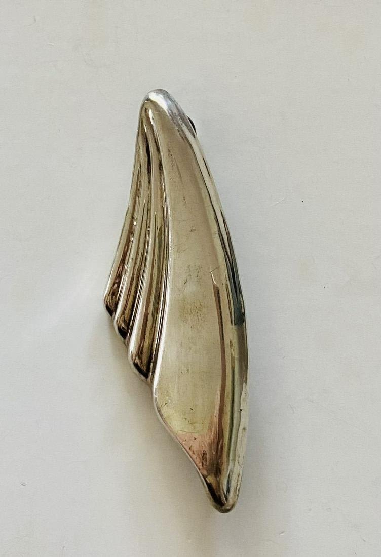 Lot 317: Mexican vintage sterling pin pendant