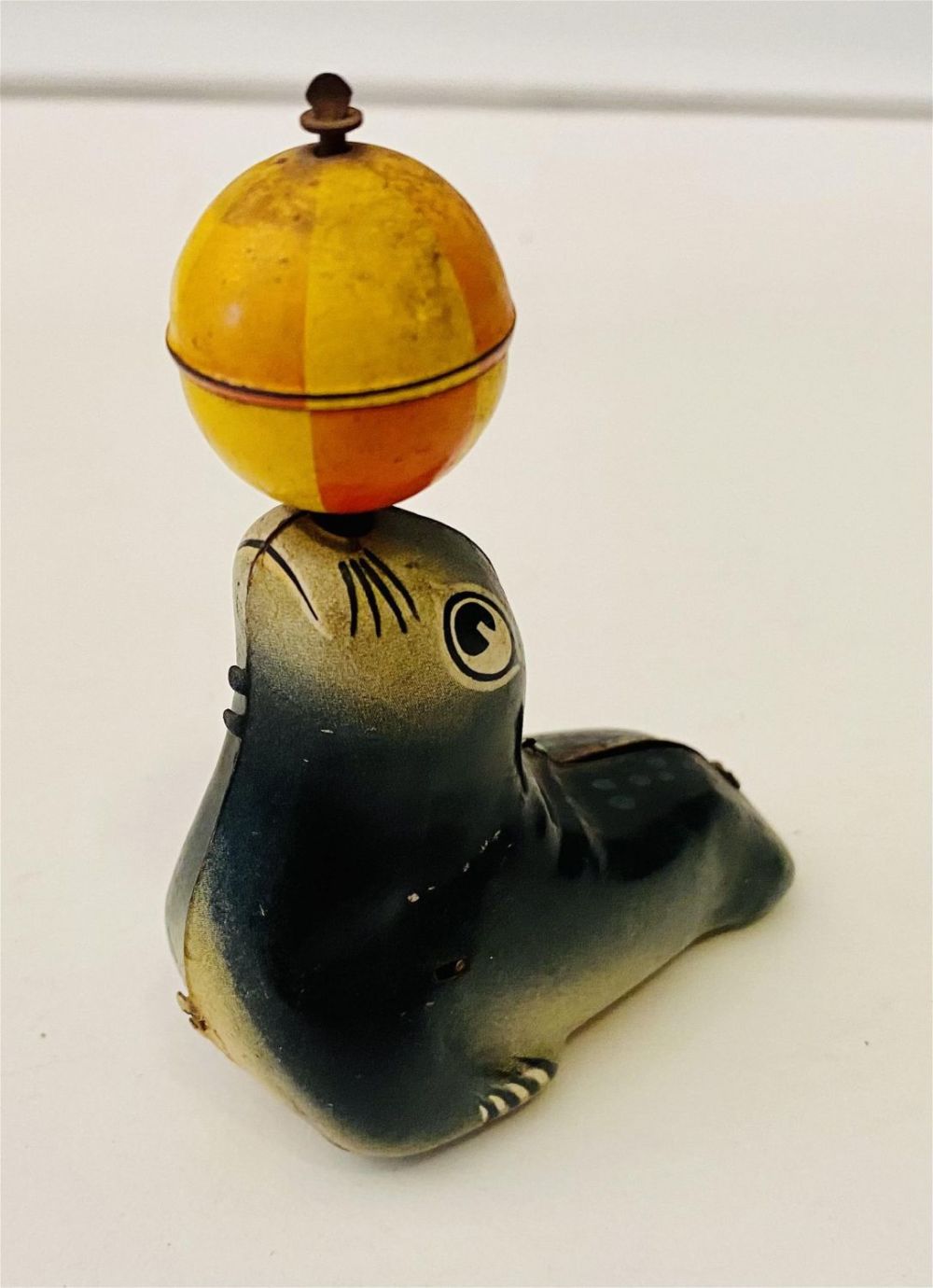 Lot 320: Seal friction old toy marked