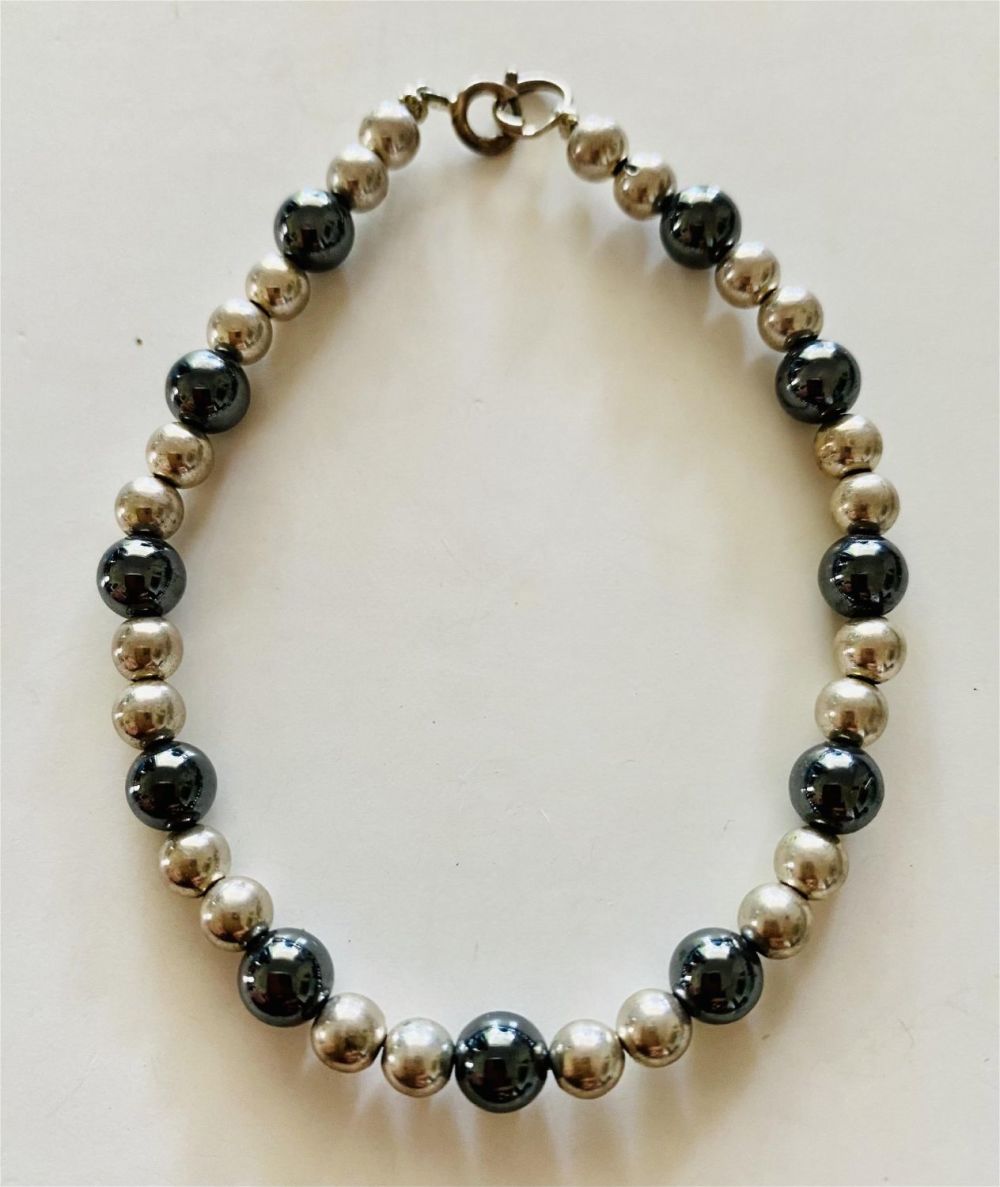 Lot 321: Sterling hematite bead bracelet