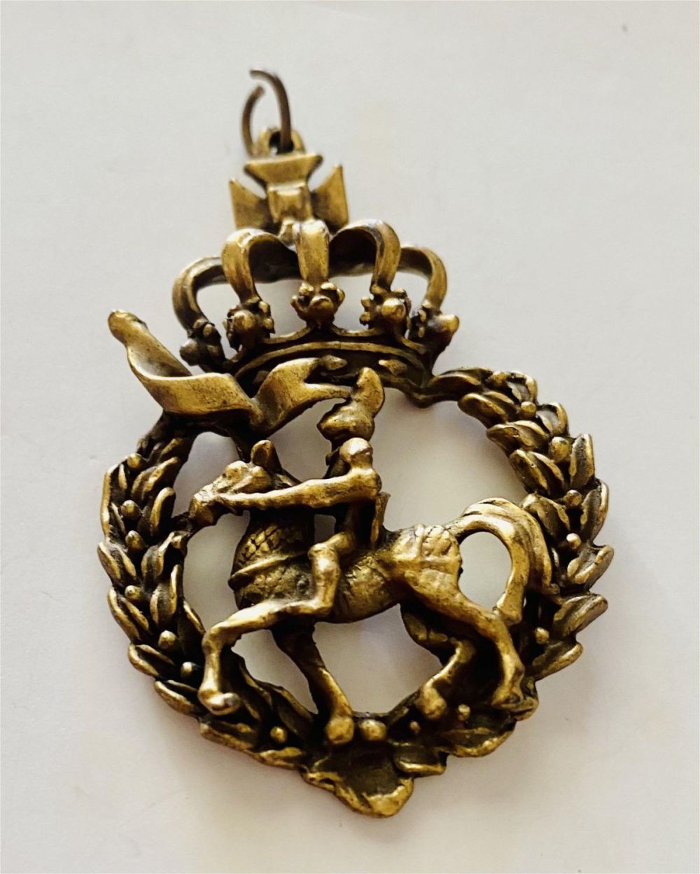 Lot 329: Knight on horse metal pendant  brass