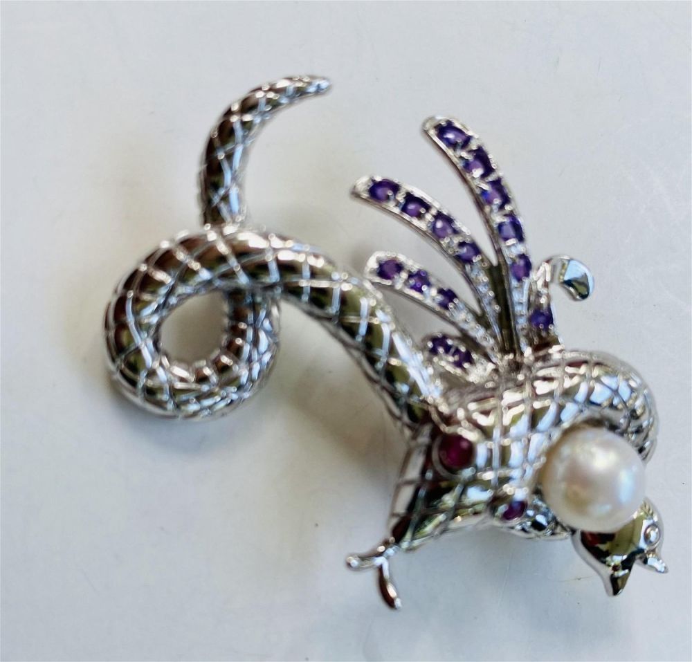 Lot 426: Sterling snake gemstone  pin