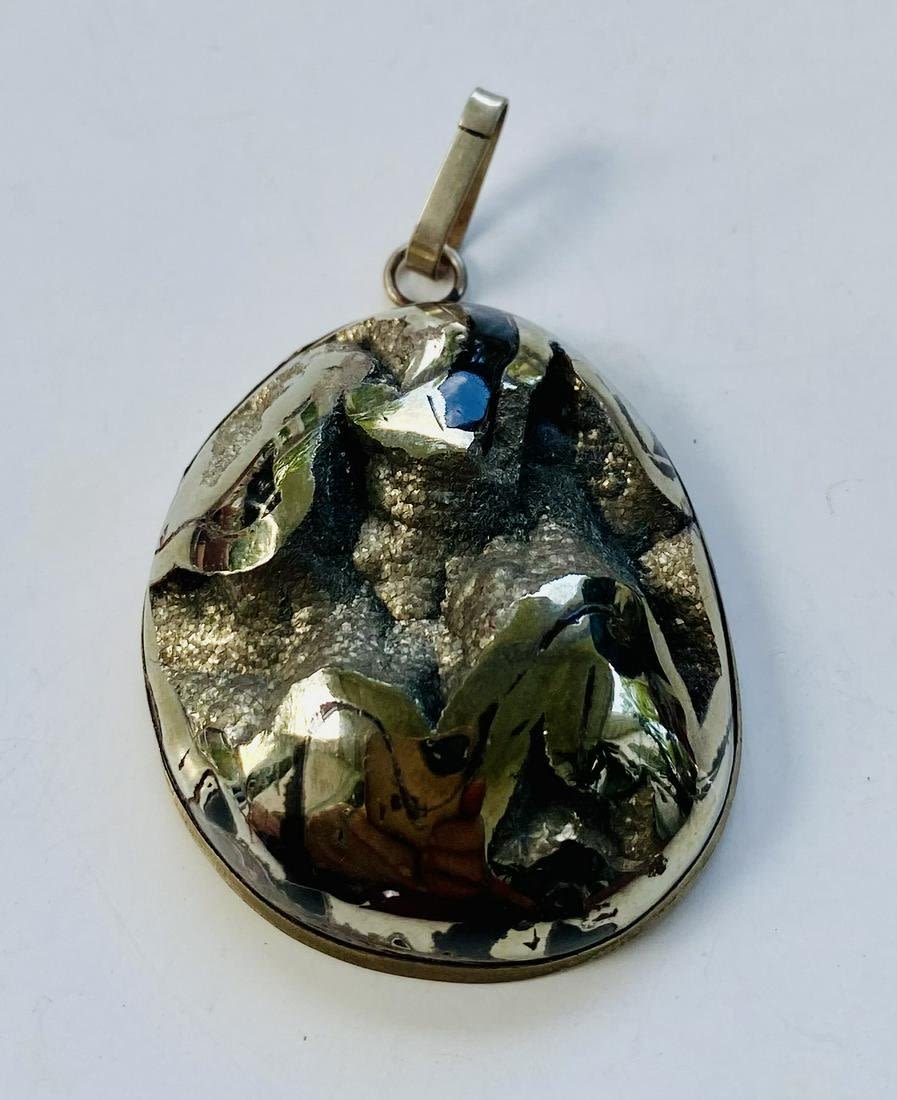 Lot 429: Pyritized Ammonite Russian cabochon pendant